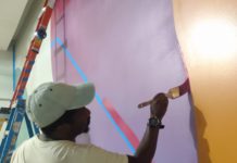 A man paints