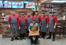 The Uzbek cooks gather for a photo