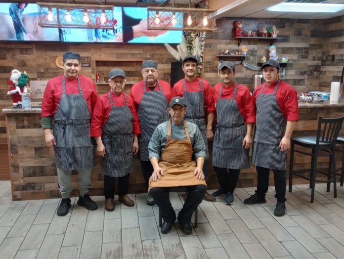The Uzbek cooks gather for a photo