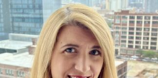 a blonde woman smiles at the camera