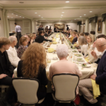 Toledo club members sit