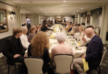 Toledo club members sit