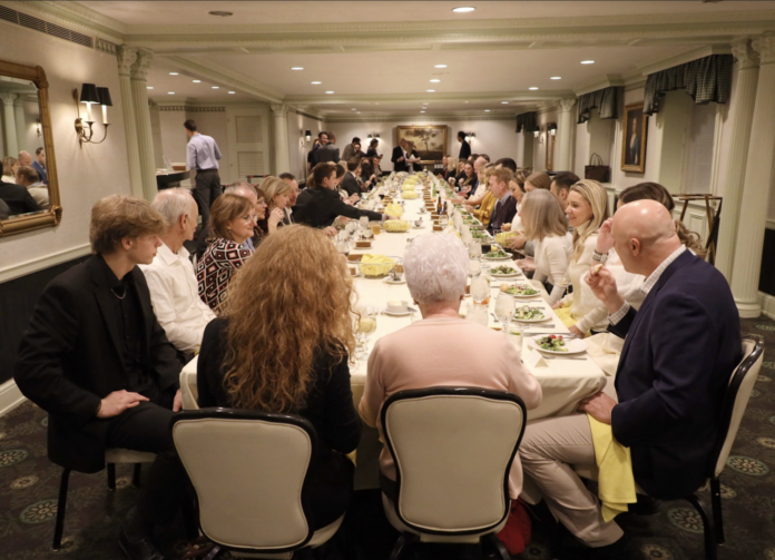 Toledo club members sit