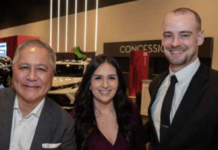 Three people smile