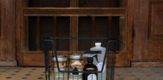 wire basket containing personal care products in reusable containers