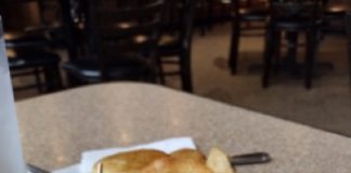 a plate of food on the counter at Charlie Mops