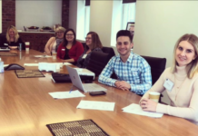 law students at a conference table