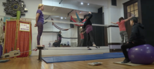 Class participants try the tightrope walking.