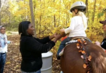 A little kid on horseback
