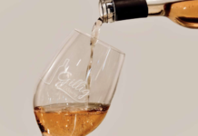Wine being poured into a glass