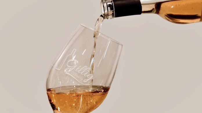 Wine being poured into a glass