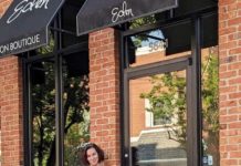 Lady standing in front of store