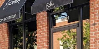 Lady standing in front of store