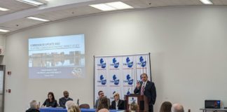 Mayor Kapszukiewicz, Rep. Grim, and TMACOG representatives speaking to the event.