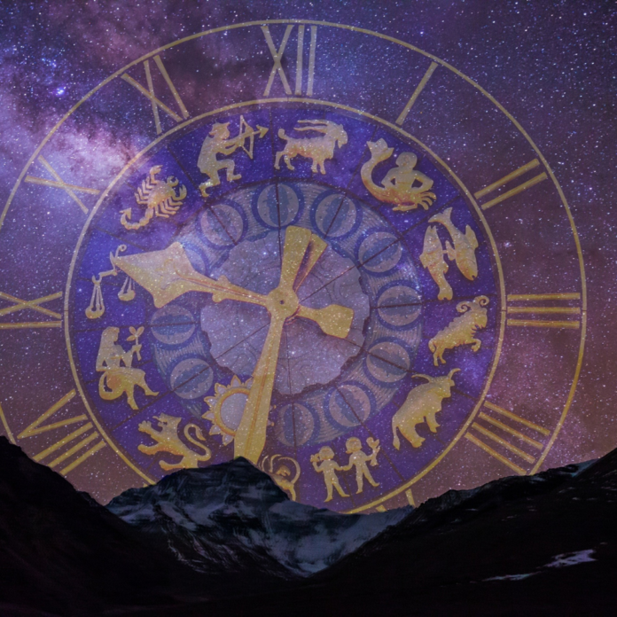A galaxy colored background with a faded astrology clock with all the month's zodiac symbols.