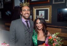 Toledo City Paper’s Single in the Glass City Competition Two winners, (left) man and (right) woman smiling with their crowns on.