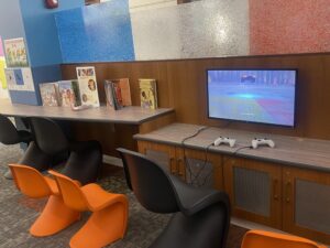 A gaming system in the Children’s section of the library.