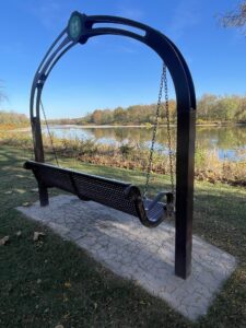Swinging bench looking onto the Maumee River.