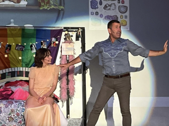 Emma (Petrie) and Barry (Jacob Toth) sharing a tender moment before the prom.