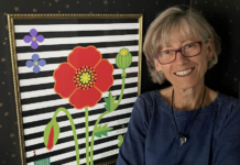 Kathy Rennels with one of her pieces.