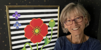 Kathy Rennels with one of her pieces.