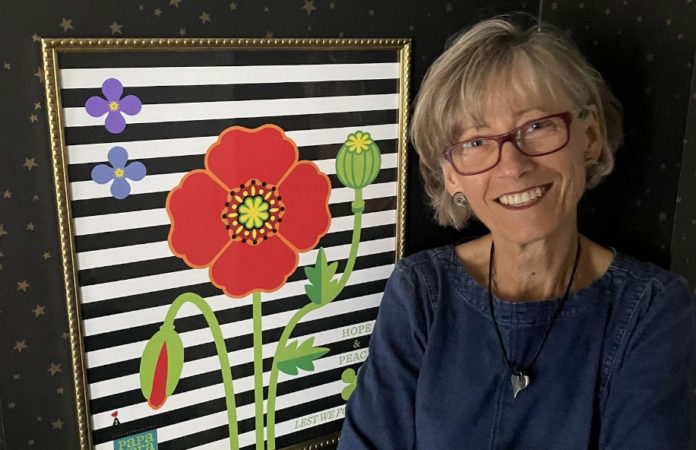 Kathy Rennels with one of her pieces.